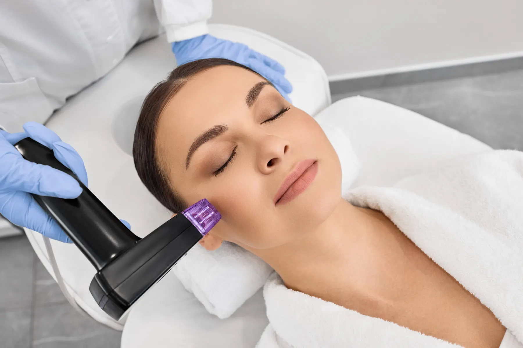 A client during a relaxing facial treatment at Bradford Skin Clinic, fifteen minutes from Cookstown