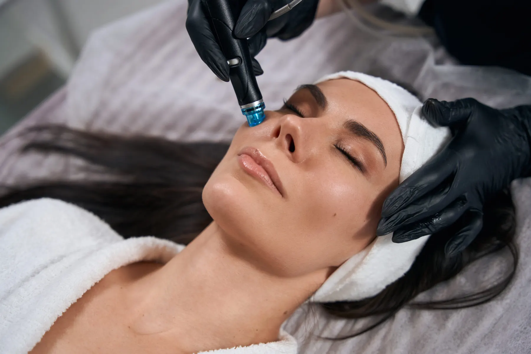 A client receiving a facial at Bradford Skin Clinic, fifteen minutes from Sharon