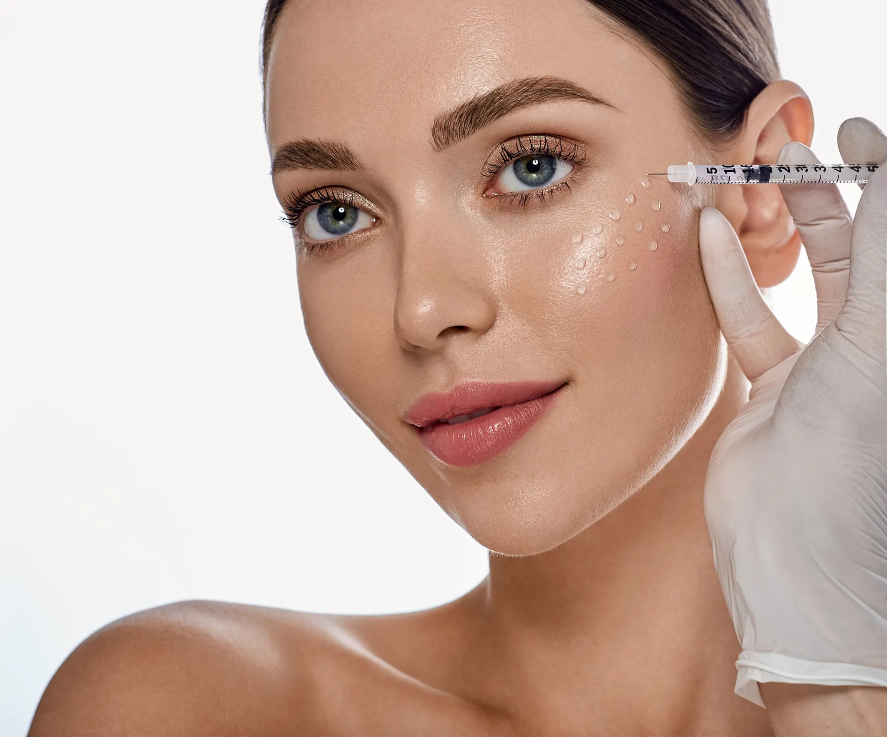 Skinbooster micro-droplets placed across the cheek